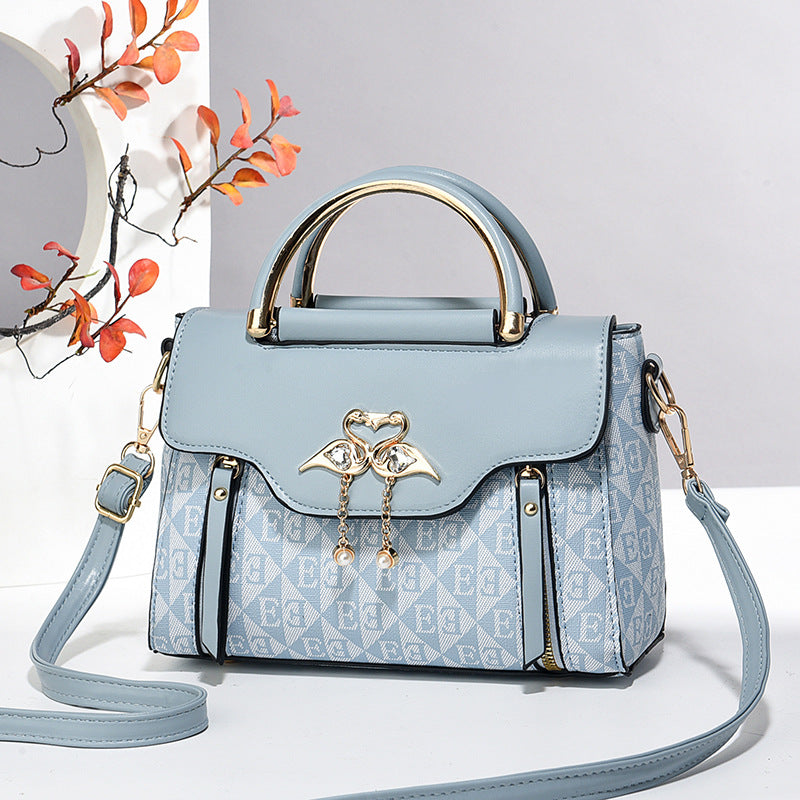 Nola Embossed Crossbody Bag