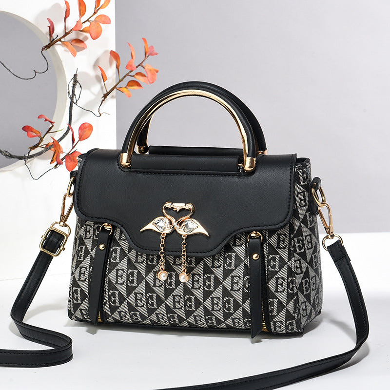Nola Embossed Crossbody Bag