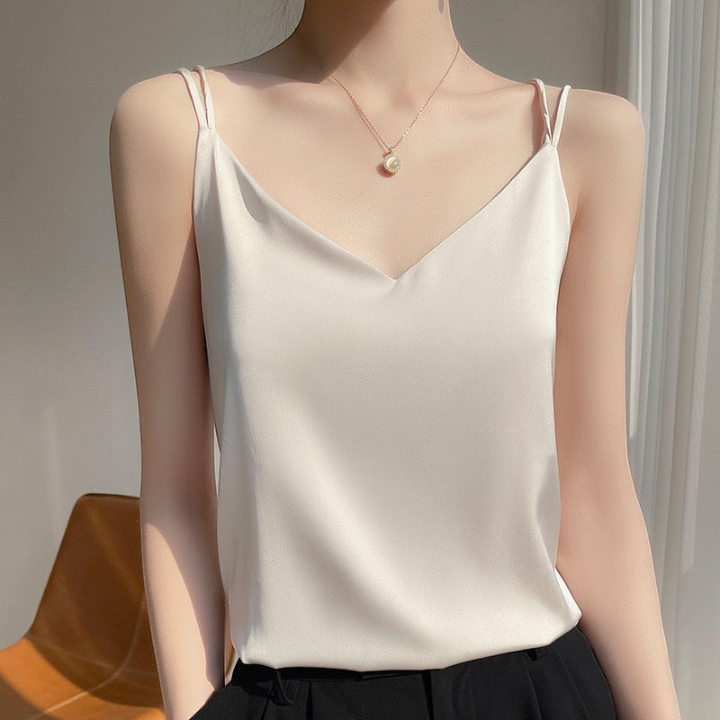 URH Talya Loose Camisole Top in cream, silky fabric, V-neckline, and spaghetti straps.