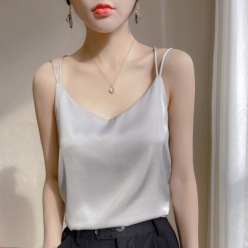 URH Talya Loose Camisole Top in silver, silky fabric, V-neckline, and spaghetti straps.