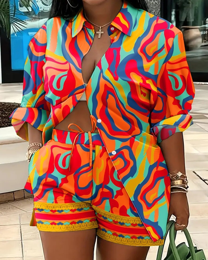 URHER women's vibrant abstract print two-piece set with long sleeve collared shirt and matching shorts.