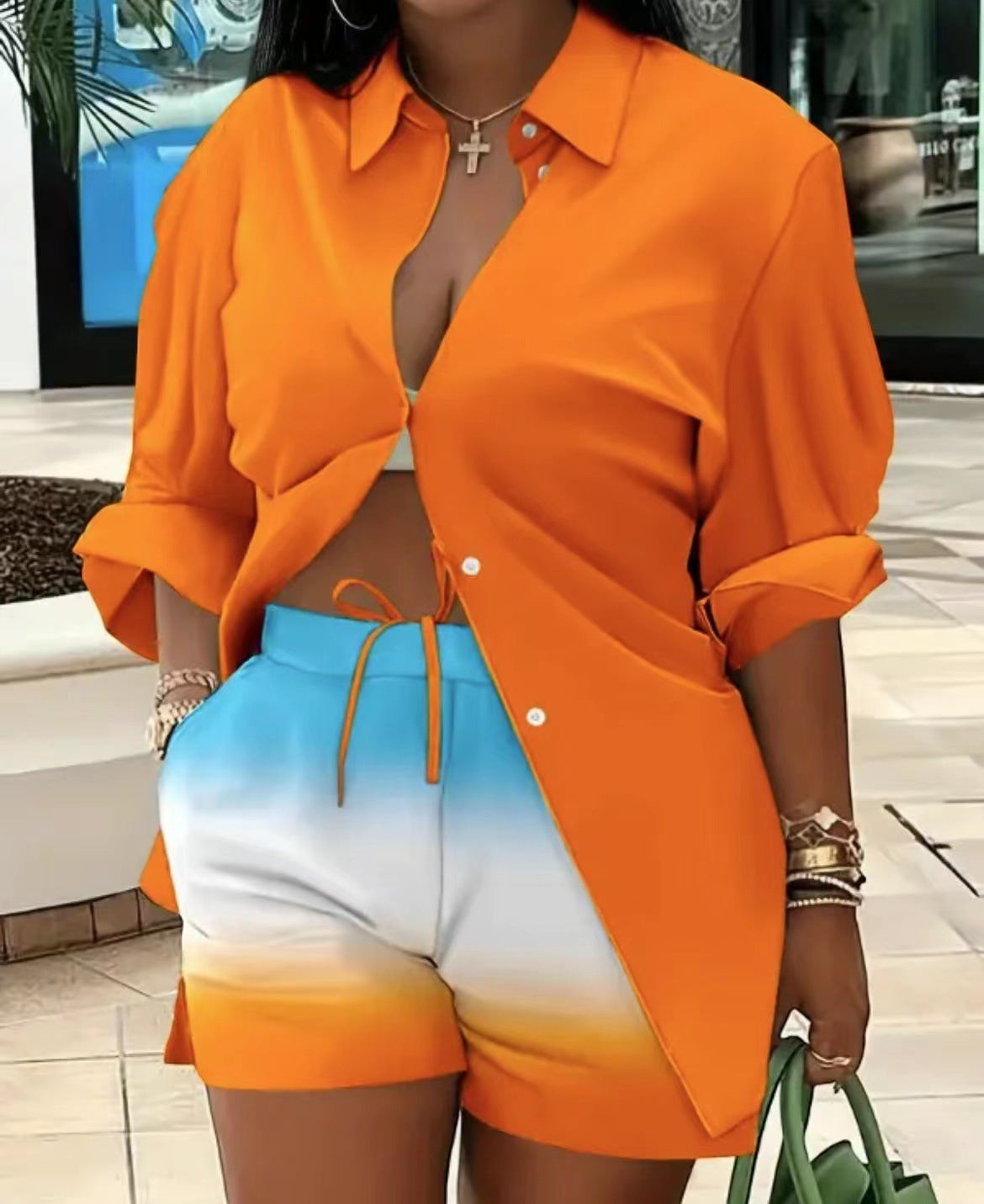 URHER orange long sleeve button-up shirt with white and blue ombre shorts. Casual two-piece set.