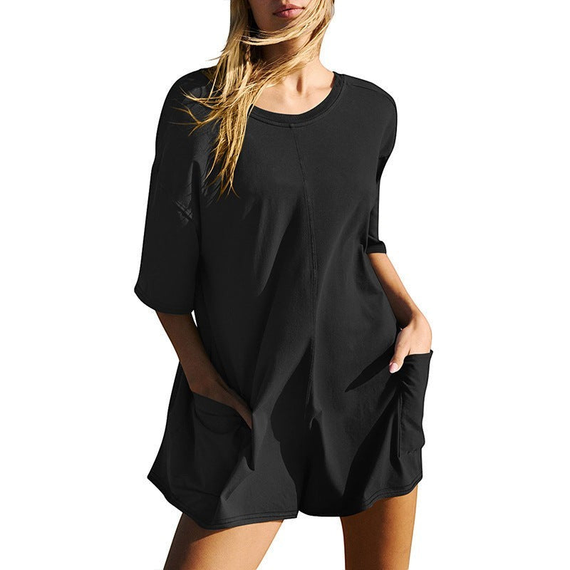 URHERE black cotton blend relaxed fit jumpsuit with crew neck and patch pockets.