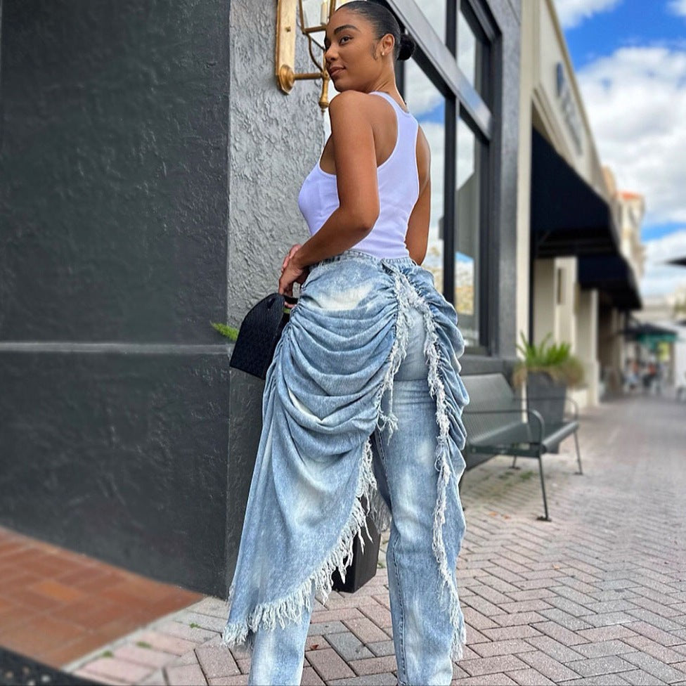 URHERHere Reese high-rise straight-leg light wash denim jeans with dramatic ruched detailing and frayed hem.