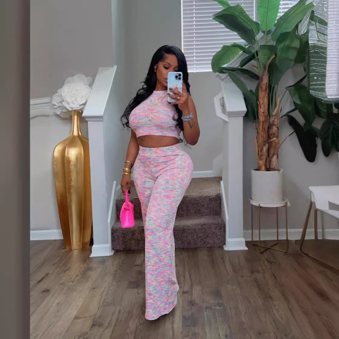 URHERHere Whitly V-neck crop top and wide-leg pants set in pastel rainbow knit fabric. Sleeveless design with side pockets.